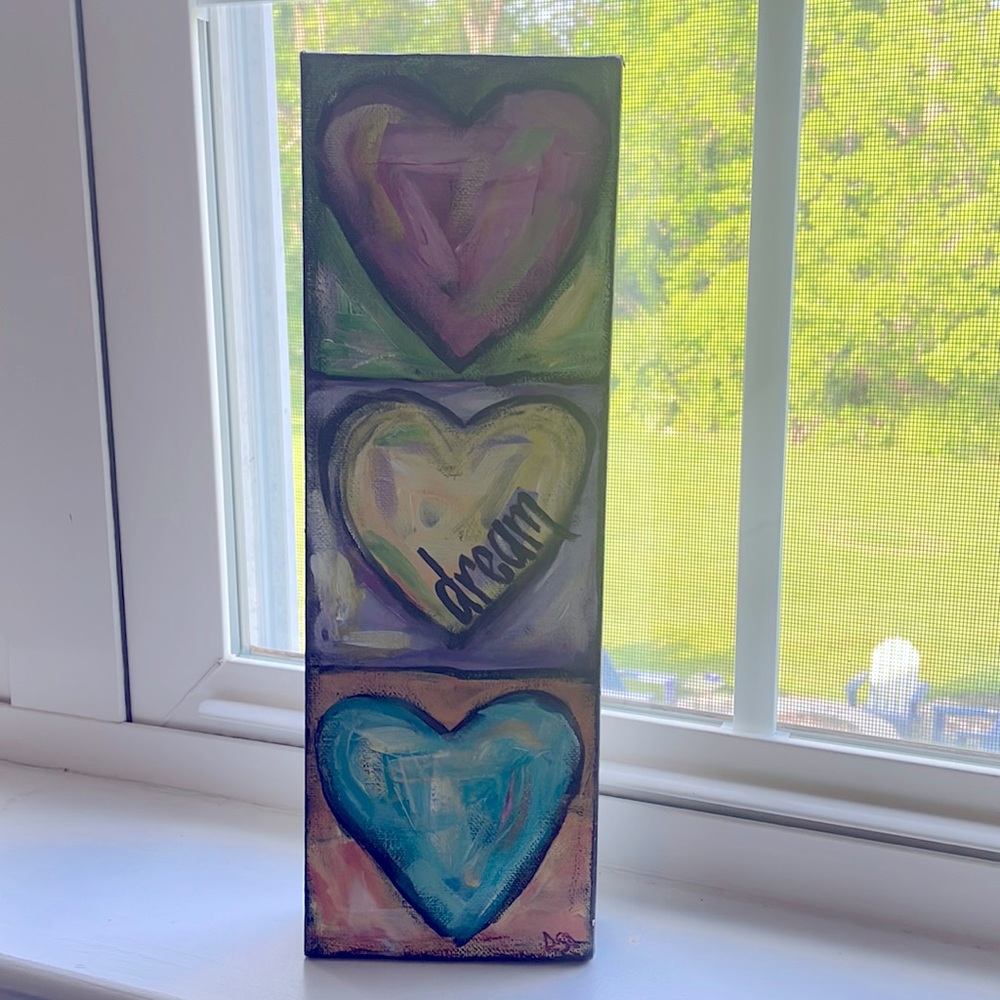Cute decor - stands on its own or can me hung.